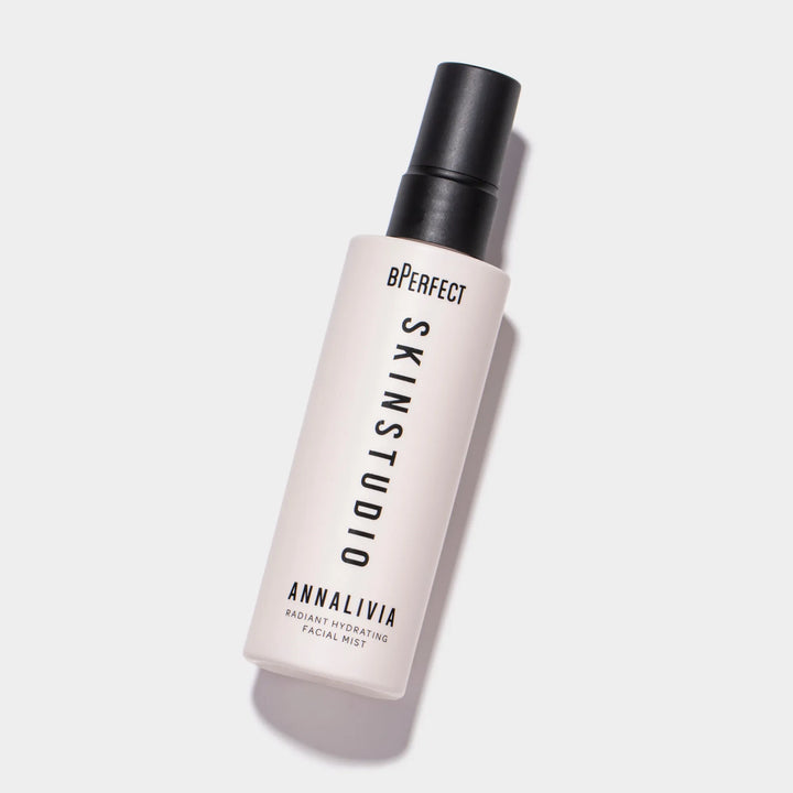 Skinstudio facial mist bottle with black cap on a white background