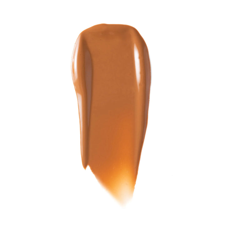 Tan makeup swatch on a white background