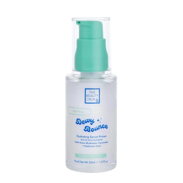 The Beauty Crop hydrating serum primer white bottle with green pump on a white background
