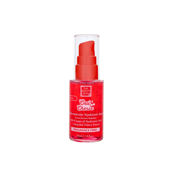 Red bottle of Oui Cherie hyaluronic serum with pump dispenser on a white background