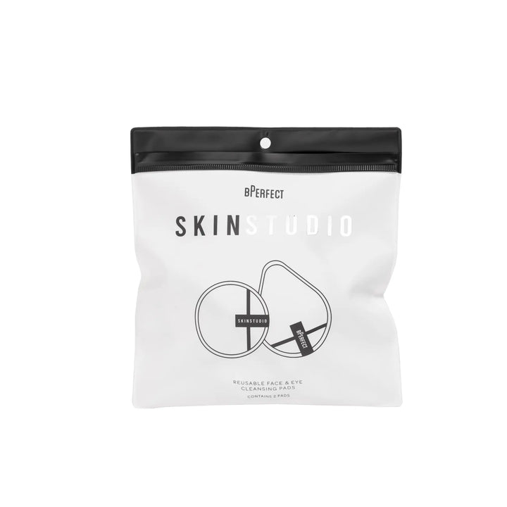 White cleansing pads packaging with black text and logo on a white background
