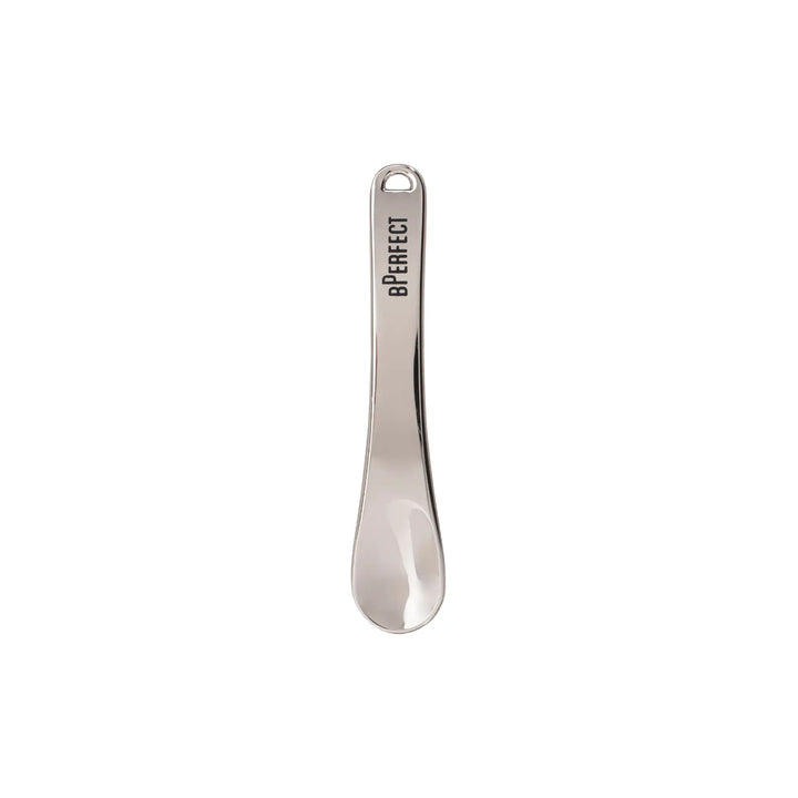 Silver spatula with 'BPerfect' branding on a white background