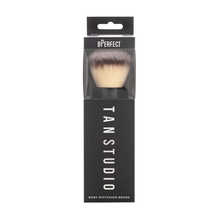 Makeup brush in packaging with 'BPerfect' and 'Tan Studio' branding on a white background